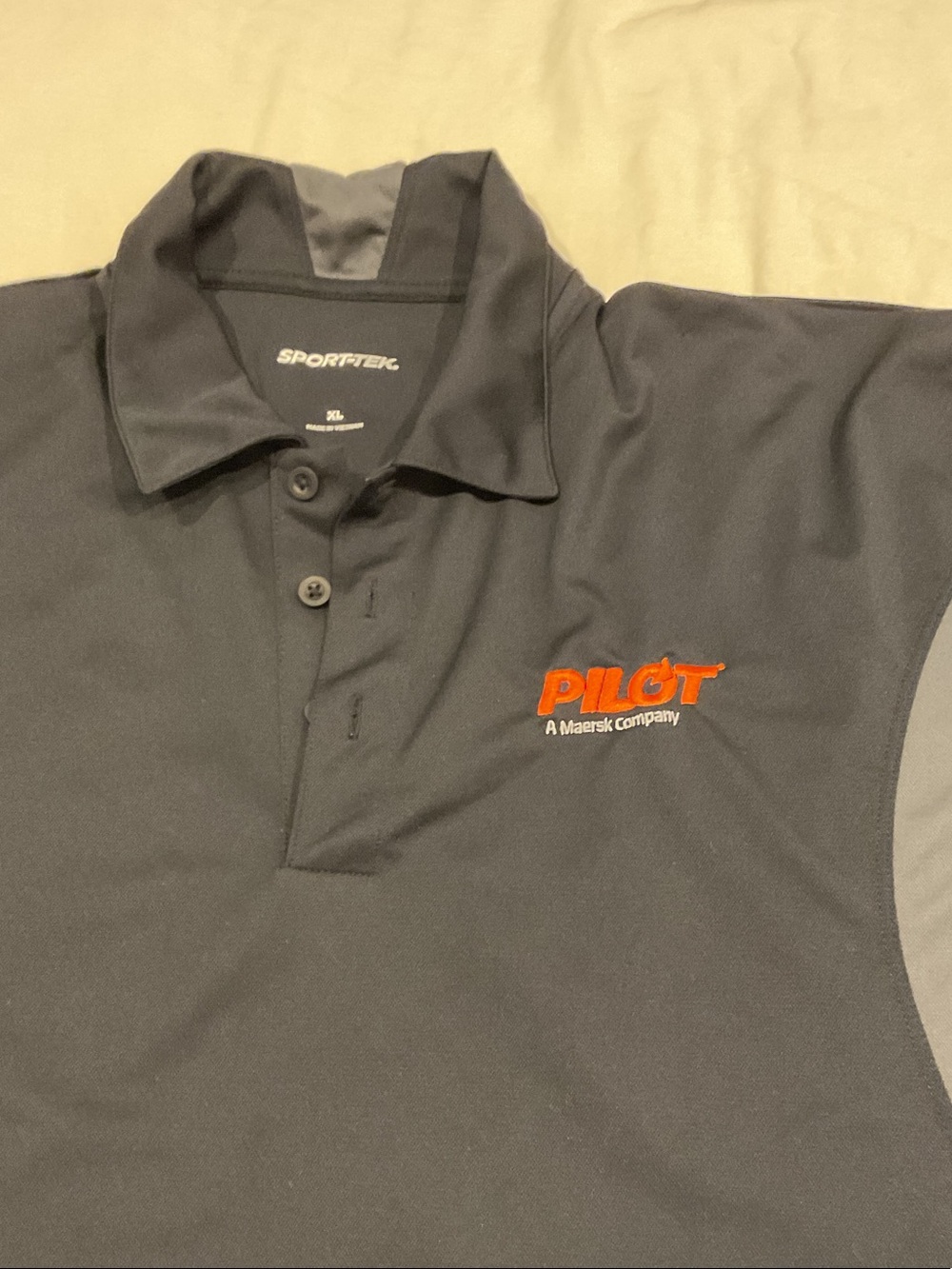 Sport-Tek Black Polo with Pilot Freight logo